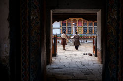Praying in bhutanese temple