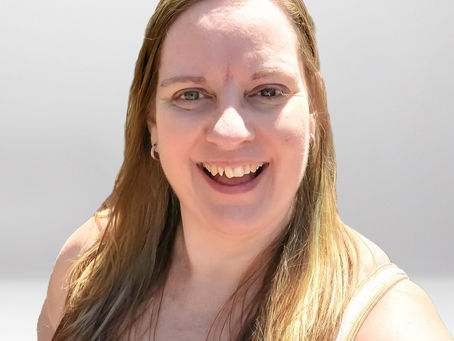 Angel Guide and Mindset Habit Coach, Rose Petz, shares her radiant smile, embodying the harmony of angel coaching and morning habits.