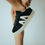 Miniatura: Zapatillas negras con rayas decorativas