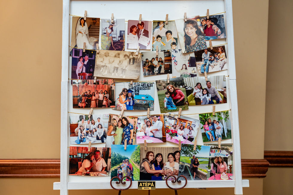Collage of family photos on a display board.