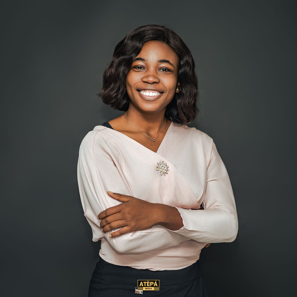 a woman with her arms crossed is wearing a shirt that says atepa on it