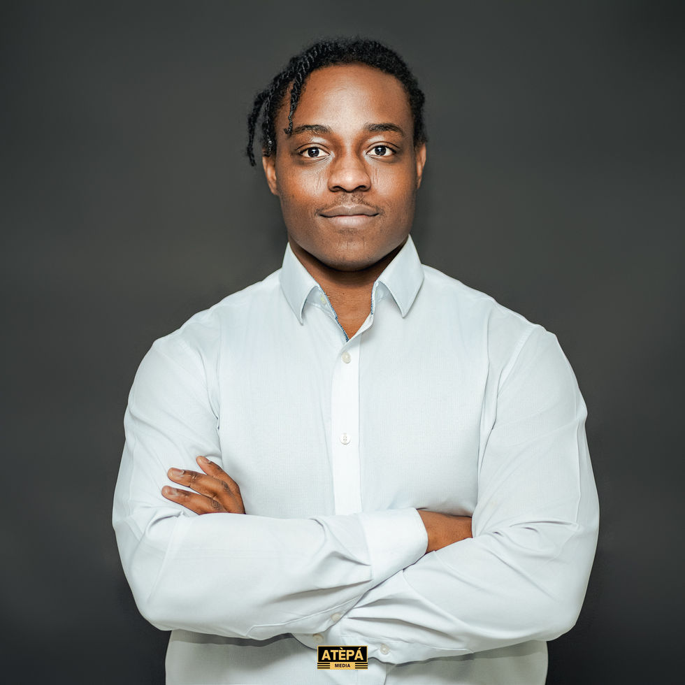 a man wearing a white shirt with the word atepa on it