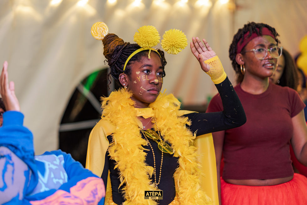 a girl in a bee costume has the word yes on her face