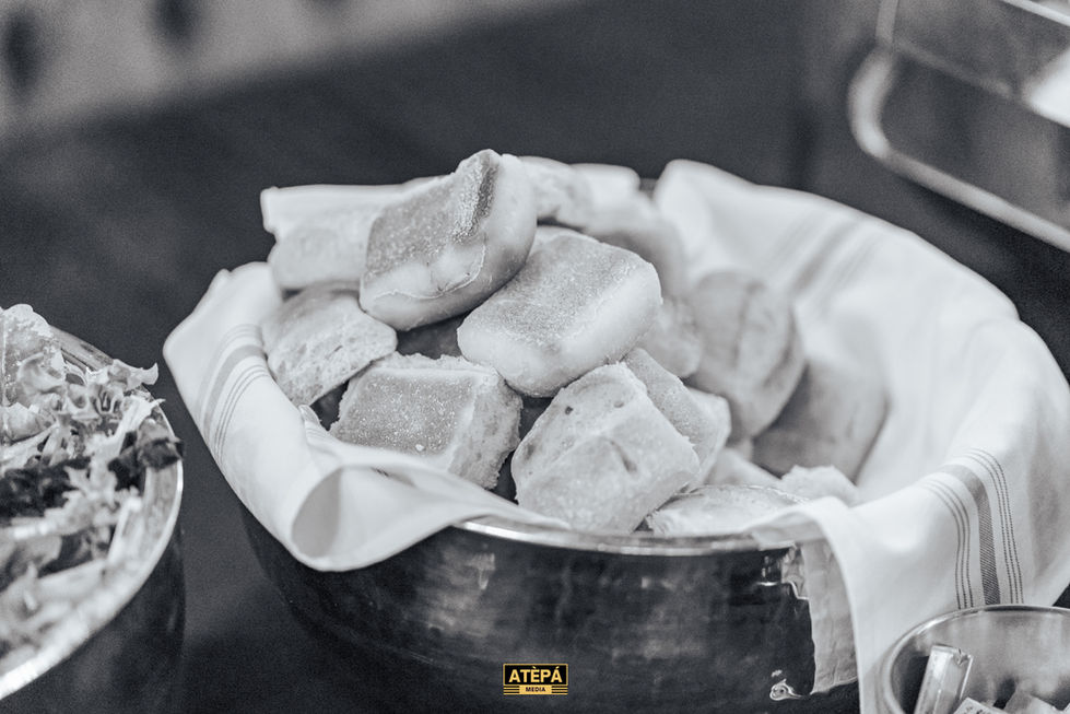 a black and white photo of a bowl of food that says atepa