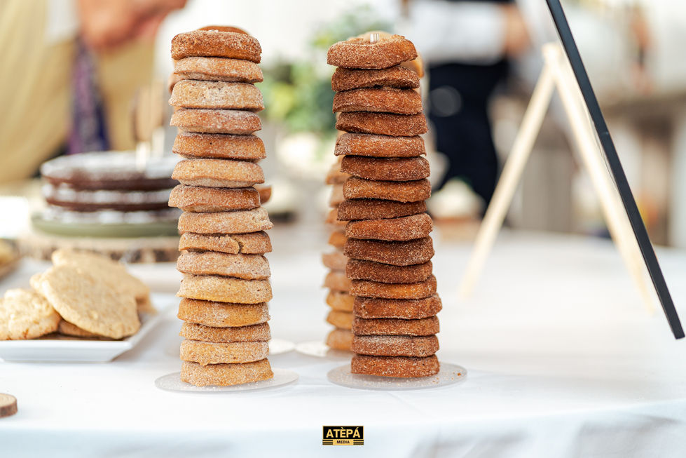 two stacks of doughnuts with the word atepa on the bottom