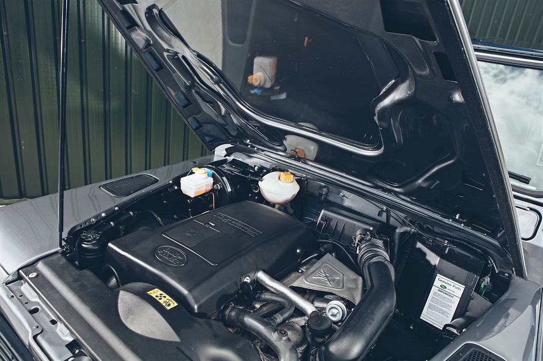 Land Rover Defender TD5 engine bay after professional servicing and maintenance by Landroid Motors