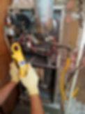 HVAC technician repairing a unit