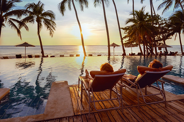 honeymoon couple relaxing near beach swi