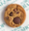 A close-up of the Triple Chocolate Chip cookie, showcasing its buttery ridges and copious amounts of chocolate