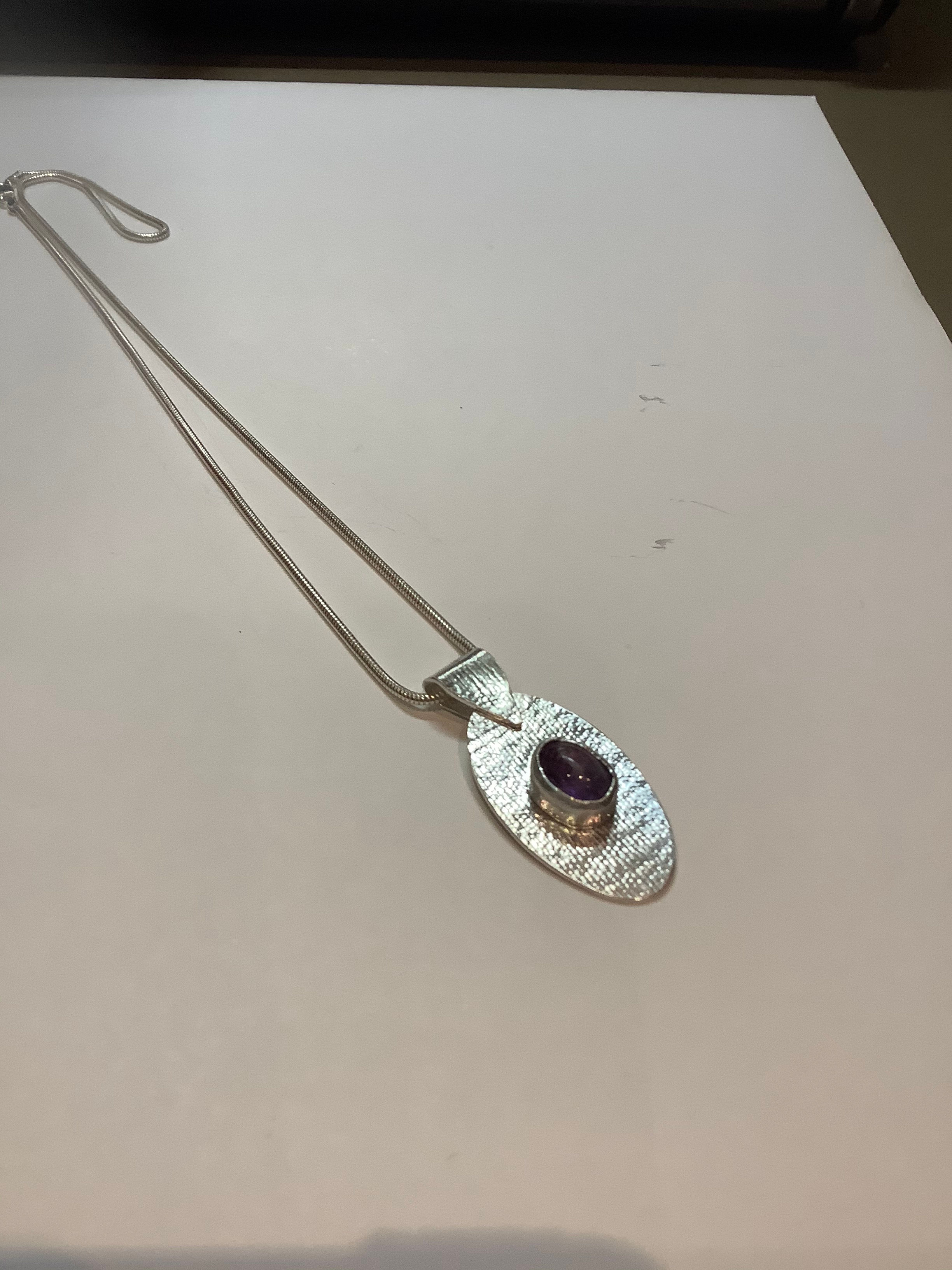 Textured Sterling Silver Oval Pendant with Oval Amethyst