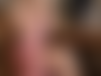 A visualisation of Lady Ava, in a pink chemise, drinking coffee. Her dutiful submissive tends to his household duties in the background