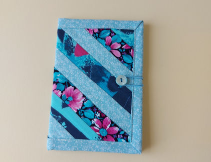 Fabric piecing is a fundamental technique in quilting and sewing where smaller pieces of fabric are sewn together to create a larger design. The beauty of fabric pieced designs lies in the uniqueness, and personal touch they bring to each project. The combination of different fabrics, colours, and patterns allows for an expression of creativity whilst the variety of shapes, colours, and textures in pieced designs creates a visually appealing and dynamic look.