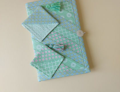 Fabric piecing is a fundamental technique in quilting and sewing where smaller pieces of fabric are sewn together to create a larger design. The beauty of fabric pieced designs lies in the uniqueness, and personal touch they bring to each project. The combination of different fabrics, colours, and patterns allows for an expression of creativity whilst the variety of shapes, colours, and textures in pieced designs creates a visually appealing and dynamic look.