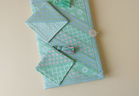 Fabric piecing is a fundamental technique in quilting and sewing where smaller pieces of fabric are sewn together to create a larger design. The beauty of fabric pieced designs lies in the uniqueness, and personal touch they bring to each project. The combination of different fabrics, colours, and patterns allows for an expression of creativity whilst the variety of shapes, colours, and textures in pieced designs creates a visually appealing and dynamic look.
