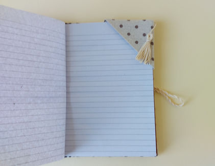 Casebound books covered in fabric are indeed beautiful and have a timeless appeal. The fabric cover and sturdy construction make these books long-lasting and able to withstand frequent handling and the feel adds a tactile dimension to the reading experience, making it more enjoyable. The covering can be made from a variety of textures and colours, giving each book a unique and elegant look. Each book is decorated with either applique or hand embroidery.