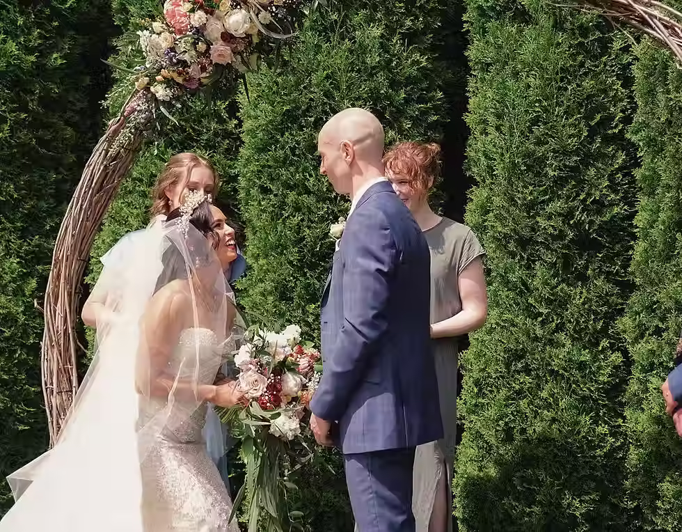 Lacebark Wedding: Happy bride and groom, Andrew and Asha, during their ceremony at Lacebark Function Centre, filmed by Christchurch Wedding Videographer Kiwi Moments Media.
