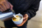 Milk foam poured into coffee