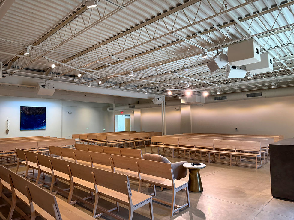 A spacious room featuring custom designed AV and lighting business solutions.
