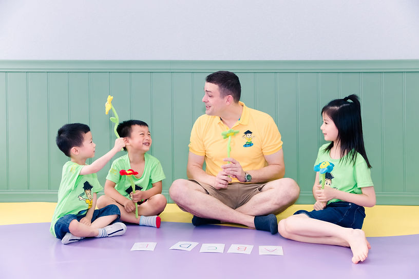 An English teacher talking with students
