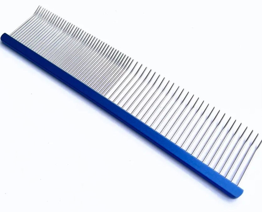 A comb with angled teeth.