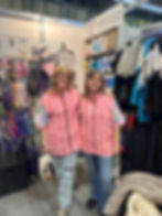 A busy trade stand at Crufts Dog Show featuring our customers wearing Clipit workwear.