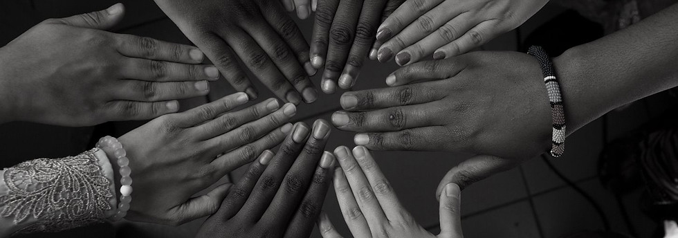 Hands of happy group of African people w