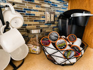 Coffee station with Keurig machine and Brooklyn-roasted coffee pods