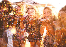 Friends blowing confetti_edited.jpg