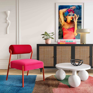 Hot pink velvet chair with red contrast framing. Very pop art contemporary art vibes