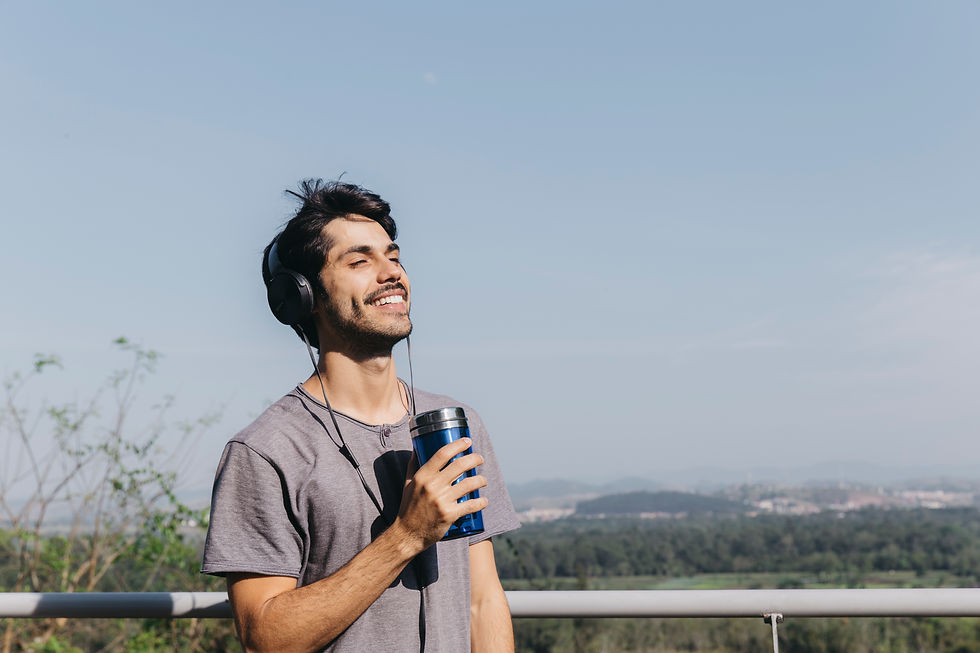man-with-headphones-thermocup.jpg