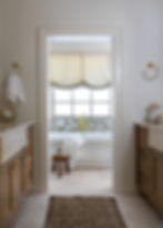 Elegant primary bathroom renovation design.