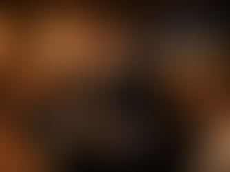 Nashville wedding DJ performing at an evening reception with colorful lighting on dance floor