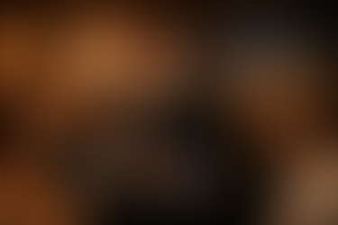 Nashville wedding DJ performing at an evening reception with colorful lighting on dance floor