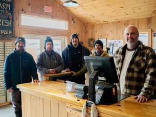 The farm team gathering for the opening of Moulton Farm's market for the 2025 season.