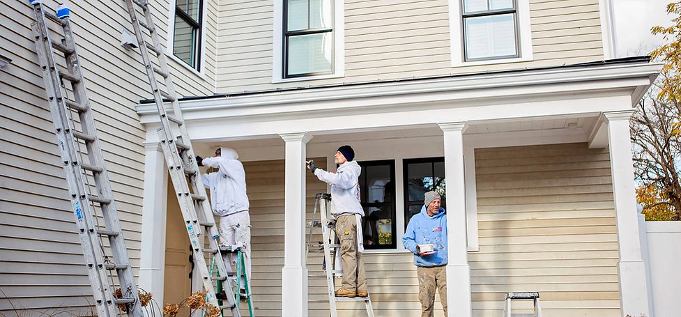 One Stop Painting & Renovating painting exterior of house