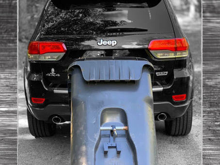 Garbage can hauler for truck