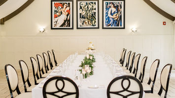 long table set up in henri-marie at mirbeau