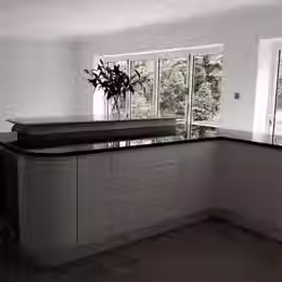 Modern kitchen with large windows