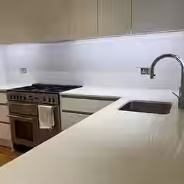 Modern kitchen with white cabinetry