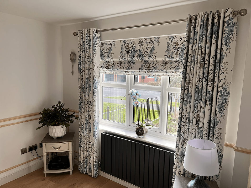 White and blue floral blinds and matching curtains