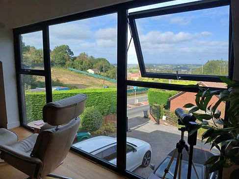 Domestic window tinting application showing the view outside with glare reduction film
