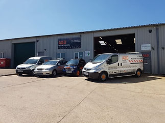 A group of cars and vans parked outside A&D Motor Services garage