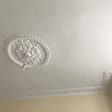 Newly plastered white ceiling corner with clean edge finish