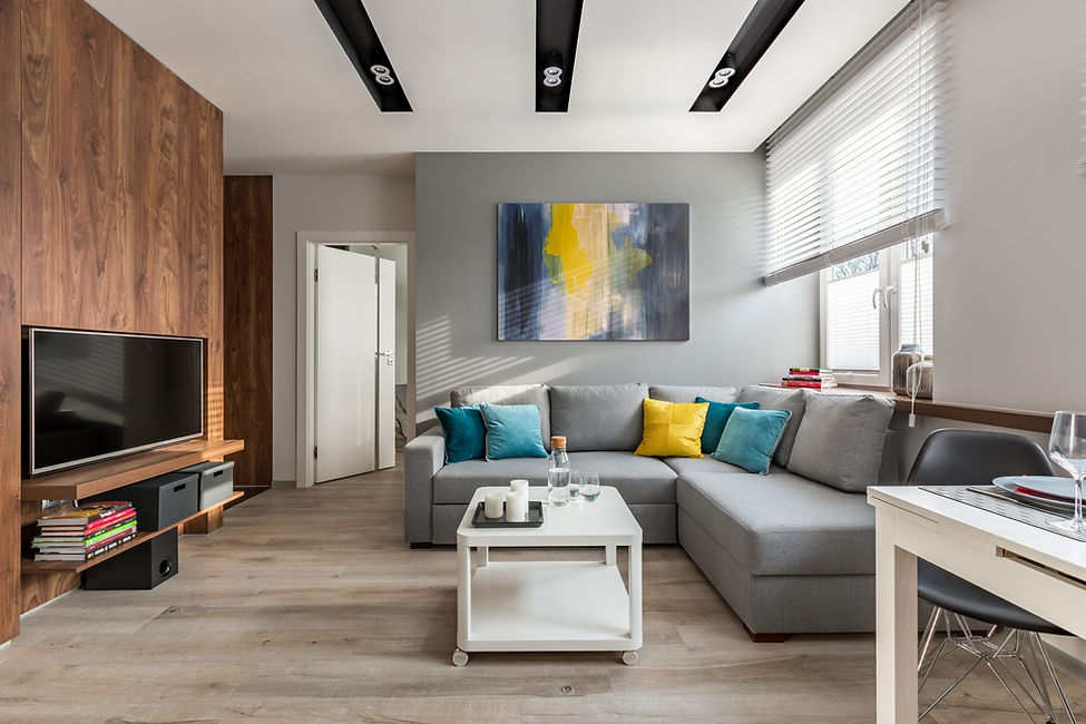 Modern open plan living room in Kirkcaldy with grey seating and high quality vinyl wrapped furniture