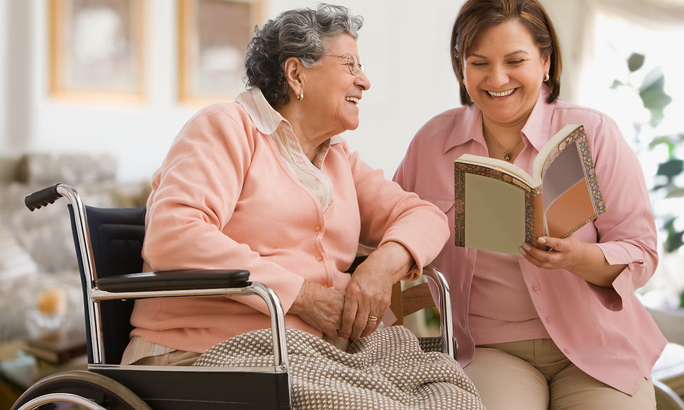 Smiling senior women enjoying a book and companionship together indoors