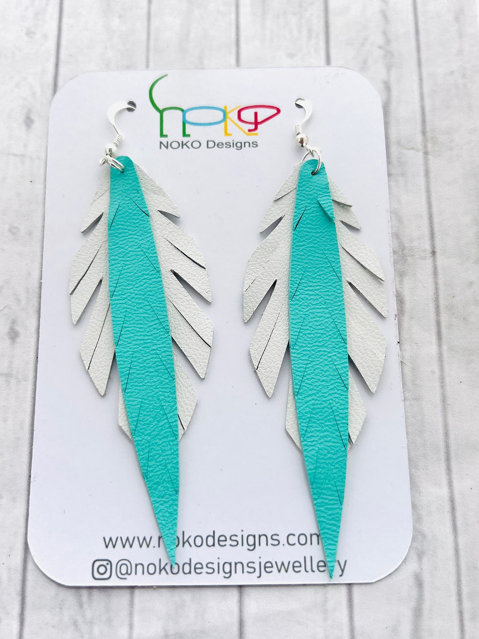 Thumbnail: White Tropical Leaf Leather Earrings
