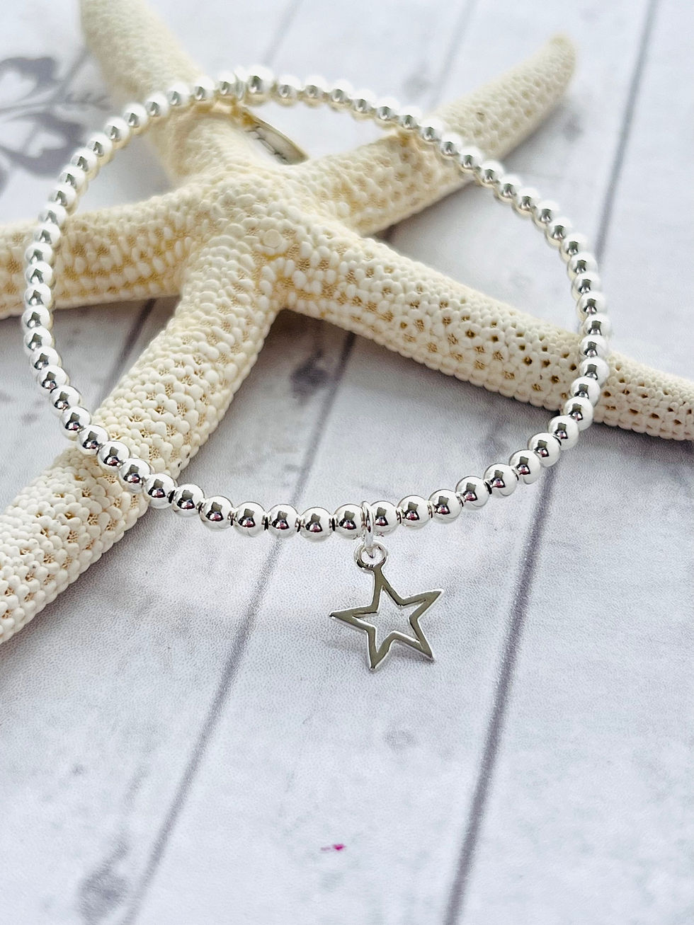 Thumbnail: Small Silver Open Star Charm Bracelet