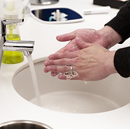 Hands being washed