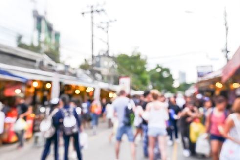 vecteezy_blurred-image-of-people-shopping-at-market-fair_10720793.jpg