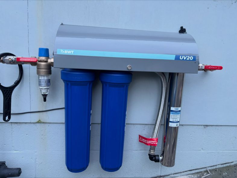 UV water filtration system installed on a wall